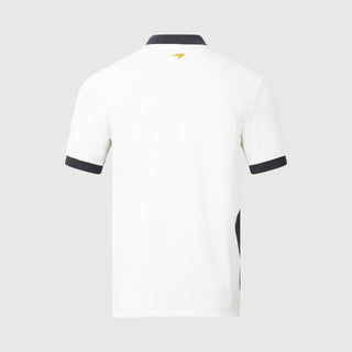 Back view of a white McLaren F1 Gulf polo shirt with black trim and gold logo.